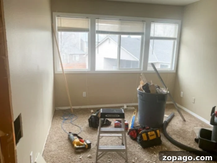 Creating Your Dream Dressing Room 6 Custom built-in shoe rack and benches beneath windows in a new walk-in closet.