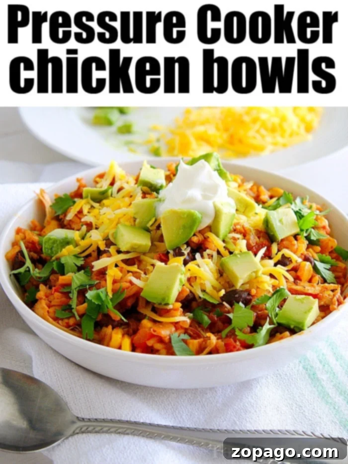 Pressure cooker chicken taco bowls are the best 15 minute dinners! Cooked in your Ninja Foodi or Instant Pot they're the best. A one pot meal with corn, black beans, rice and tender chicken all in a bowl. #instantpot #chicken #ninjafoodi #crockpotexpress #tacos #chickentacobowl Two generously filled Instant Pot Chicken Taco Bowls, topped with fresh cilantro, sour cream, and lime wedges, ready for a delicious family meal.
