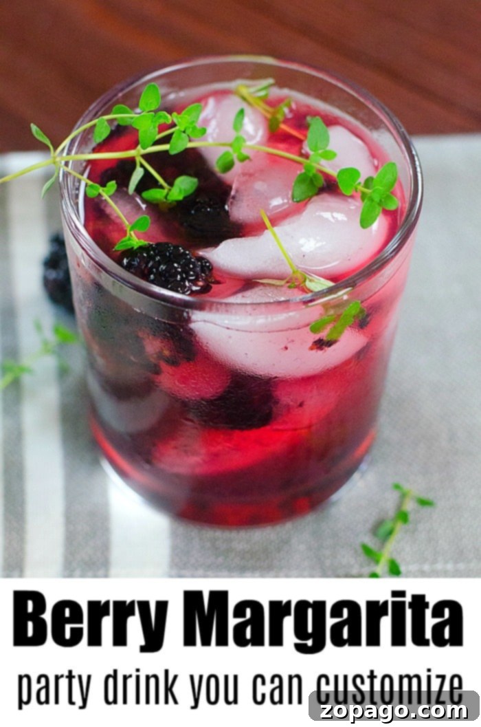 Summer cocktail recipes you will love! All have the option to make them into a mocktail too for the kids. Different fresh fruit adds sweetness naturally. #summer #drinks #fruit #cocktail #mocktail A vibrant berry margarita garnished with fresh berries and a lime wedge