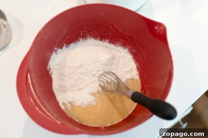 Fluffy flour is key to light and airy baked goods. Correctly measured fluffy flour ready for baking