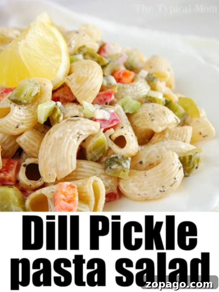 Zesty Dill Pickle Pasta Salad Without Sour Cream 5 A refreshing bowl of dill pickle macaroni salad, garnished with fresh dill.