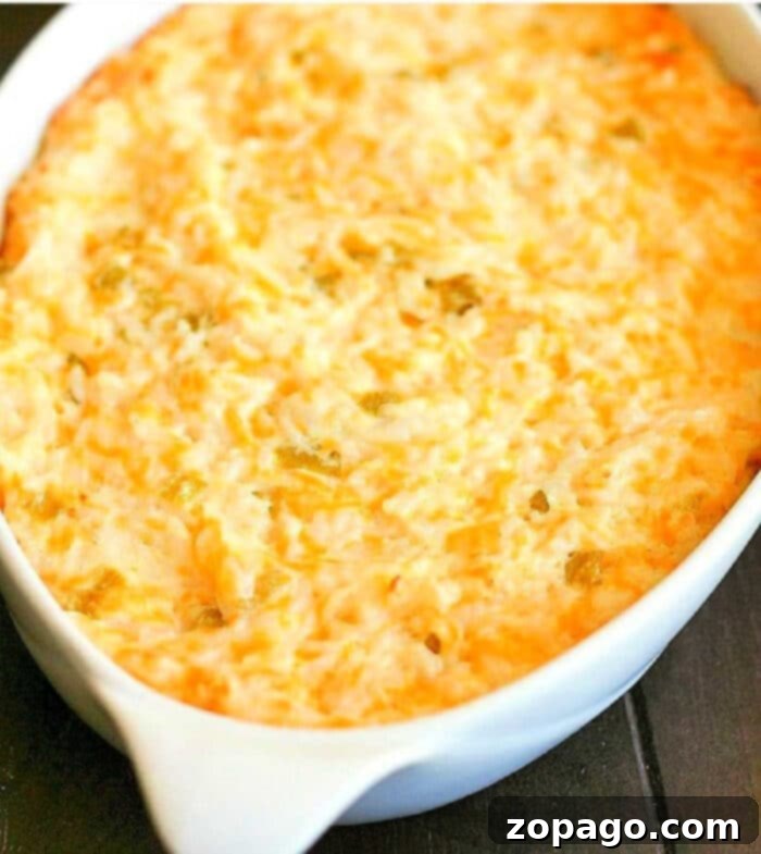 Creamy Green Chile Chicken Casserole 2 Creamy green chile chicken casserole with melted cheddar cheese