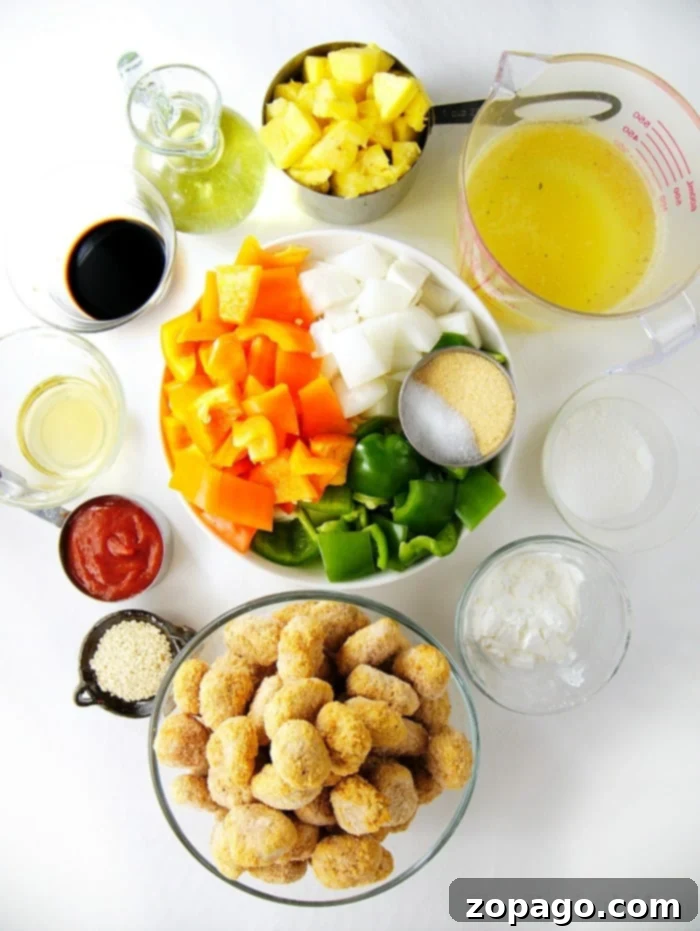 in an Instant Pot is the easiest meal ever that everyone loves! Panda Express copycat recipe for sure. #instantpot #chicken #sweetandsourchicken #pressurecooker #easy #thetypicalmom pressure cooker sweet and sour chicken with frozen popcorn chicken