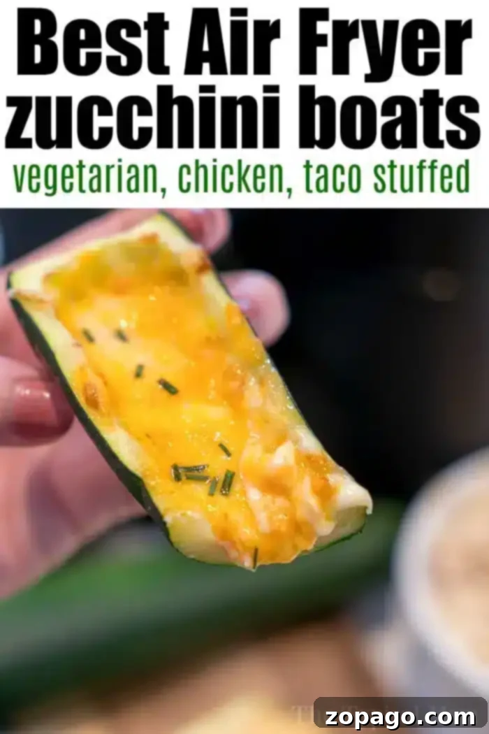 Air fryer zucchini boats are a great dinner or snack! Made vegetarian, stuffed with chicken or ground beef they're cooked fast in our Ninja Foodi. #zucchini #zucchiniboats #vegetarian #chicken #stuffed #taco #groundbeef #keto #ninjafoodi A hand holding a zucchini boat brimming with melted cheese and fresh herbs, showcasing the delicious filling. The image is optimized for best air fryer zucchini boat recipes, including vegetarian, chicken, and taco stuffed variations.