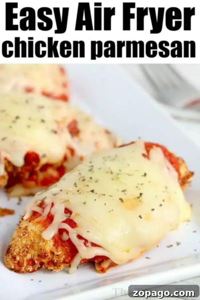 Easy Air Fryer Chicken Parmesan – A Family Favorite Close-up of air fryer chicken parm, topped with melted cheese and fresh herbs on a white plate. The text at the top reads 'Easy Air Fryer chicken parmesan.'