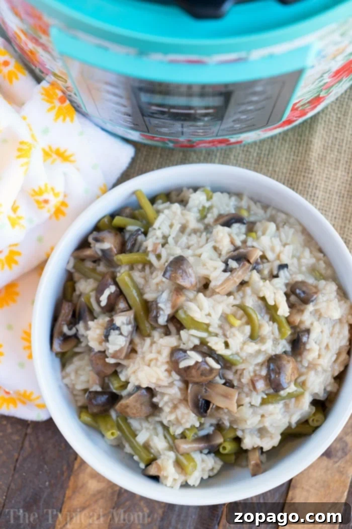 Perfectly cooked Instant Pot mushroom rice Close-up of fluffy Instant Pot mushroom rice with green beans
