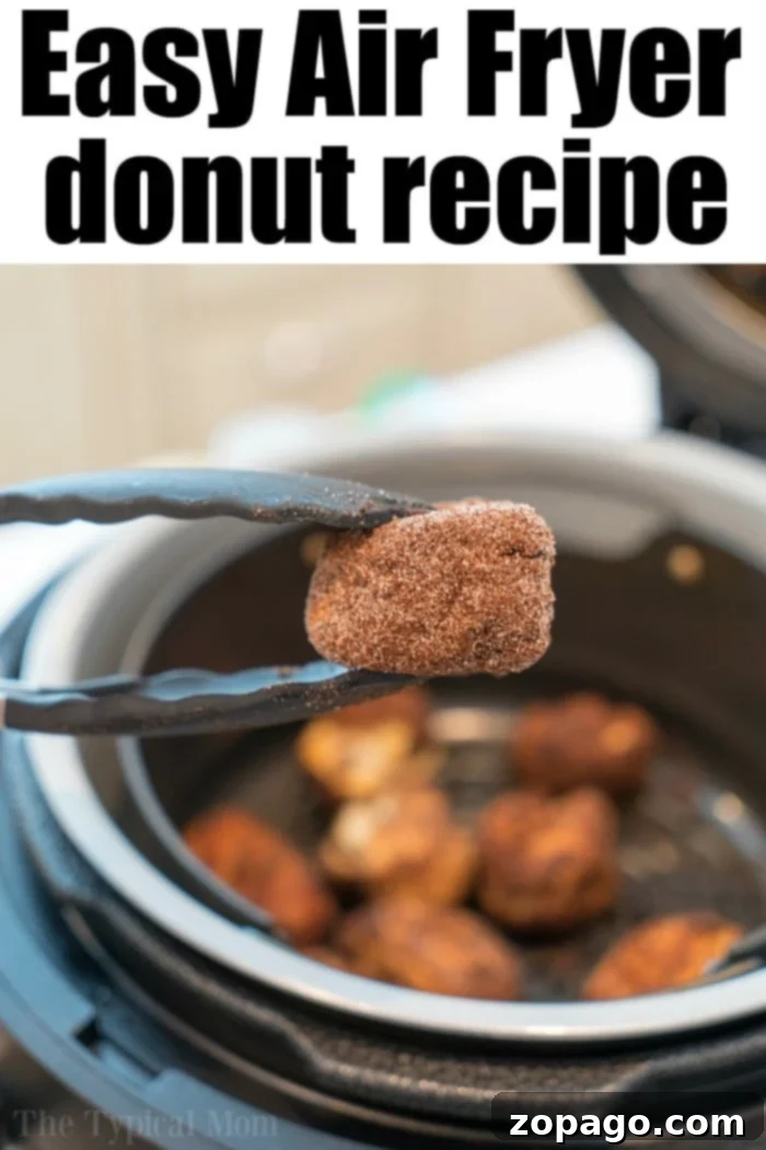 Air fryer donuts using cinnamon rolls and cinnamon and sugar! Soft on the inside and crispy outsides, make these in your Ninja Foodi tonight! #airfryer #airfryerrecipe #donuts #cinnamonrolls #ninjafoodi #ninjafoodirecipes #airfryerdonuts ninja foodi donut recipe