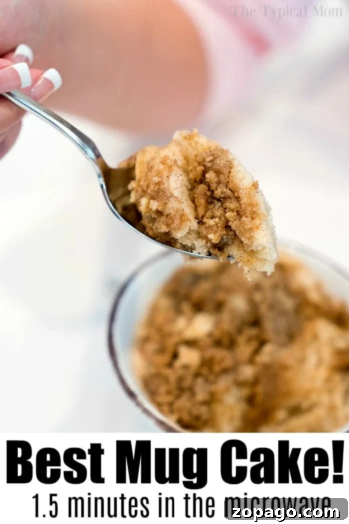 Instant Coffee Cake Mug 7 A spoonful of crumbly mug cake above a bowl with text: Best Easy Mug Cake Recipe! Just 1.5 minutes in the microwave.