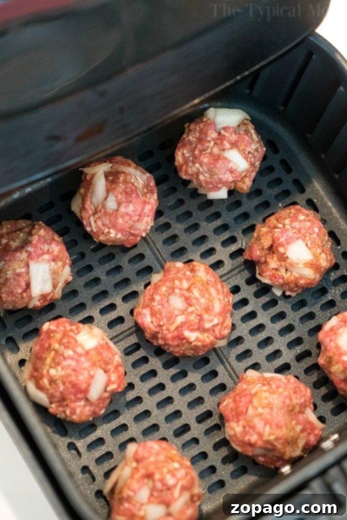 Easy Air Fryer Meatballs 11 A perfectly cooked batch of meatballs in Air Fryer, showcasing a crispy exterior.
