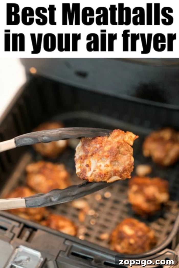 Easy Air Fryer Meatballs 9 A basket of frozen meatballs ready for the air fryer, illustrating how easy it is to cook.