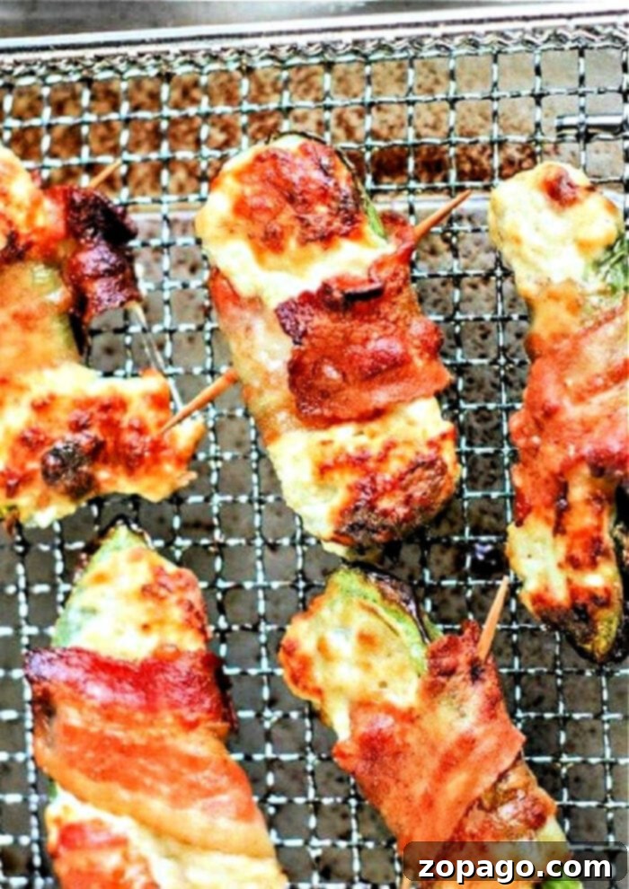 Crispy Air-Fried Bites 2 Crispy air fryer jalapeno poppers ready to be served as a healthy snack or appetizer.