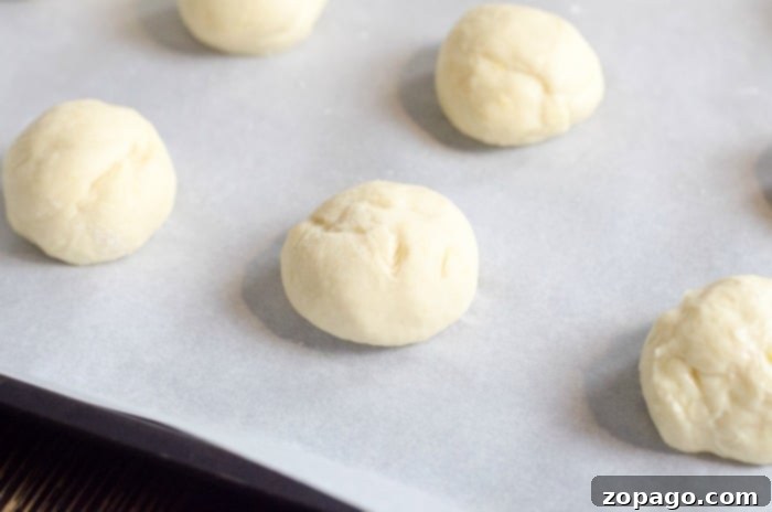 How to make donut holes from scratch. Close-up of fluffy homemade donut dough before frying