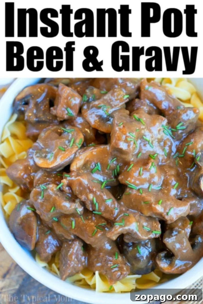 Savory Instant Pot Beef Tips 9 Close-up of Instant Pot beef tips with a rich, savory gravy, garnished with fresh herbs, showcasing the tender meat and delicious sauce.