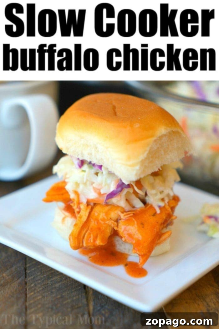 Crockpot buffalo chicken sliders! Make low carb wrapped in lettuce or on small buns as an appetizer or tasty main dinner. Slow Cookers rock. #crockpot #crockpotrecipes #crockpotchickenrecipes #buffalochicken #lettucewraps #spicychicken #slowcookerchicken #buffalochickensliders Hearty crockpot buffalo chicken sliders on a plate with fresh toppings
