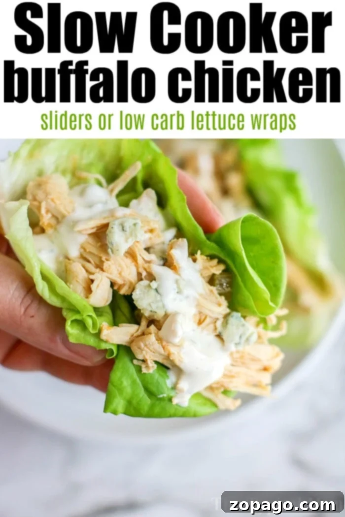 Low Carb Crockpot buffalo chicken sliders are so good! Make wrapped in lettuce or on small buns as an appetizer or tasty main dinner. Slow Cookers rock. #crockpot #crockpotrecipes #crockpotchickenrecipes #buffalochicken #lettucewraps #spicychicken #slowcookerchicken #buffalochickensliders Low carb Crockpot buffalo chicken sliders served in lettuce wraps