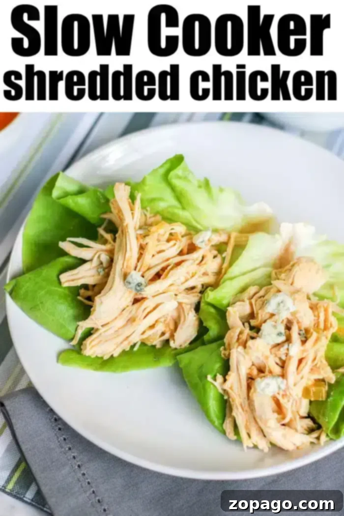 Crockpot buffalo chicken lettuce wraps! Make low carb wrapped in lettuce or on small buns as an appetizer or tasty main dinner. Slow Cookers rock. #crockpot #crockpotrecipes #crockpotchickenrecipes #buffalochicken #lettucewraps #spicychicken #slowcookerchicken #buffalochickensliders Crockpot buffalo chicken lettuce wraps ready to serve