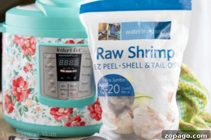 Instant Pot Shrimp Boil 3 Frozen shrimp being prepared for an Instant Pot shrimp boil.