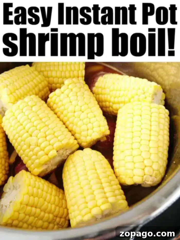 Quick Instant Pot Shrimp Boil 6 A close-up view of an Instant Pot frozen shrimp boil, featuring large, juicy shrimp amidst corn and potatoes.