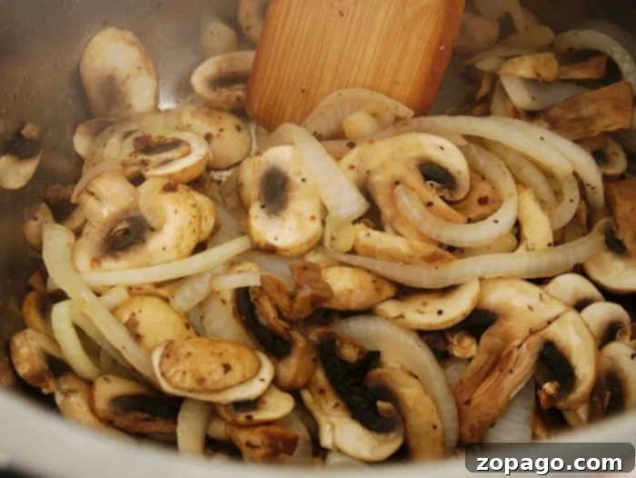 Instant Pot Homestyle Salisbury Steak 2 Close-up of creamy, rich mushroom gravy, a key component of a delicious Salisbury steak.
