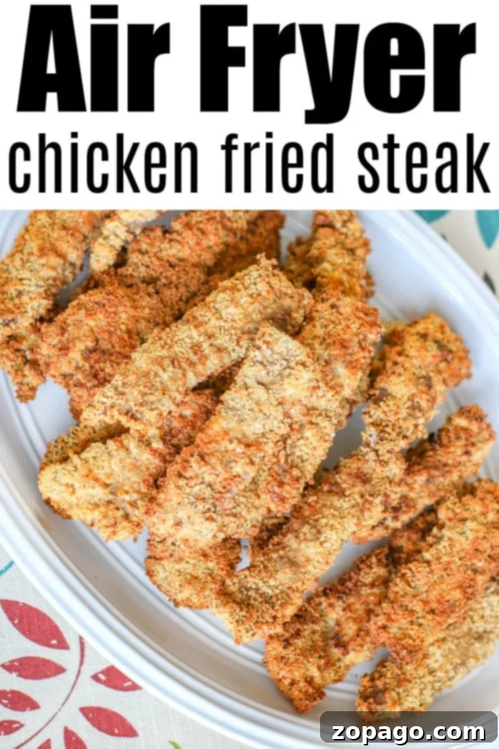 Deliciously crispy Air Fryer Chicken Fried Steak, ready for any meal. Platter of golden brown Air Fryer Chicken Fried Steak fingers, perfectly crispy.