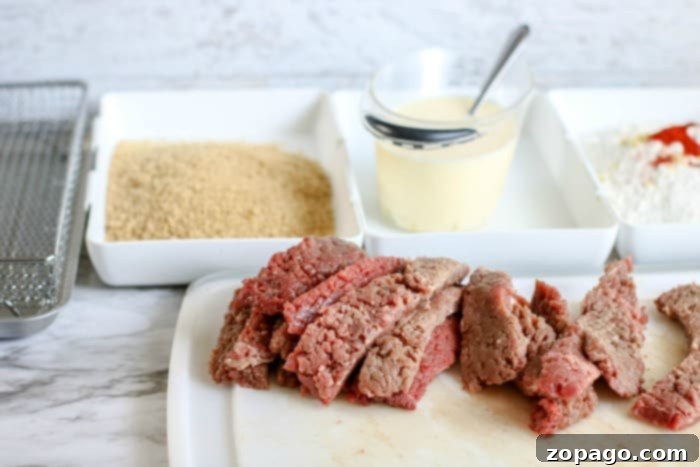 Perfectly Crispy Air Fryer Chicken Fried Steak 6 Crispy air fried country fried steak, golden brown and ready to eat.