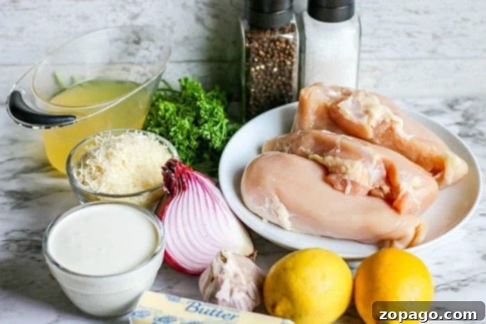 Slow Cooker Lemon Pepper Chicken 3 Crockpot lemon chicken with tender chicken pieces and vibrant sauce, ready to serve.