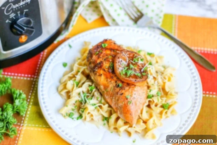 Slow Cooker Lemon Pepper Chicken 5 Close-up of a flavorful lemon pepper chicken dish, showcasing the tender chicken and zesty sauce.