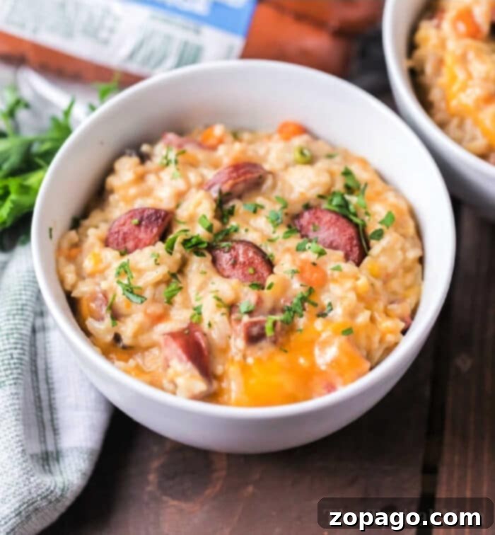 Hearty Cheesy Instant Pot Sausage and Rice 2 Instant Pot Sausage and Rice Casserole - A delicious one-pot meal with smoked sausage, cheesy rice, and vegetables.