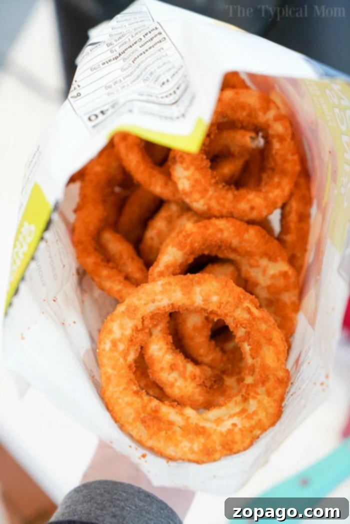 Air fryer frozen onion rings turn out so crispy and delicious! Making Ninja Foodi onion rings as a side dish is our jam, I bet you'll love them too. Air Fryer Frozen Onion Rings