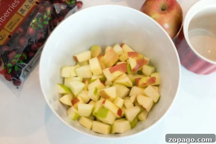 Golden Air Fryer Apple Oat Crisp 4 Perfectly diced apples ready for a delicious air fryer apple crisp.