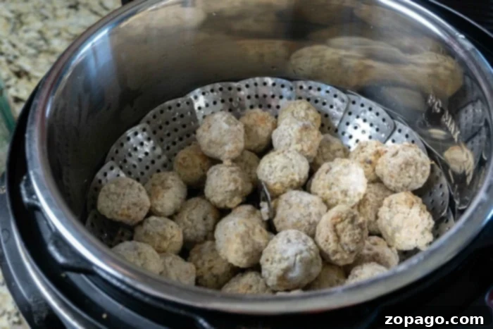 Easy Instant Pot Meatballs 5 Steamed Instant Pot Meatballs, ready for sauce or to be added to another dish.