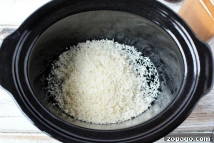 A bowl of freshly made homemade rice pudding, warm and inviting, ready to be enjoyed as a classic dessert.