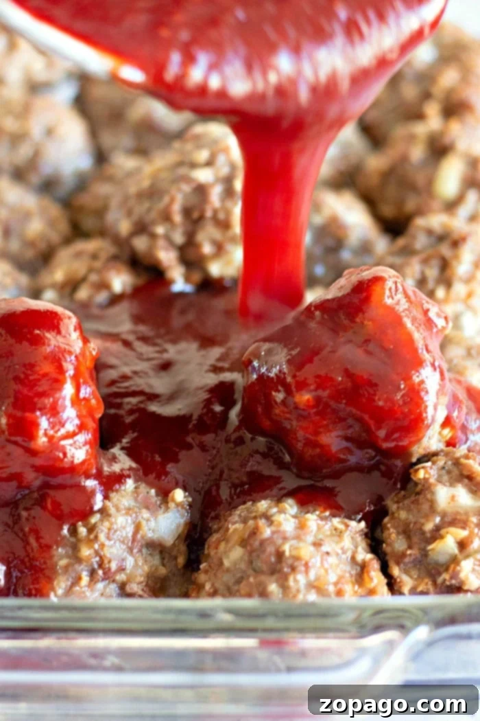 Basic meatball recipe you can use in spaghetti or sauced as an appetizer! Easy to make in your oven with a few ingredients in just 10 minutes. #meatballs #meatball #thetypicalmom #homemade Savory Meatball Appetizers for Entertaining