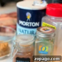 Assorted spices and seasonings on a kitchen counter for the steak dry rub