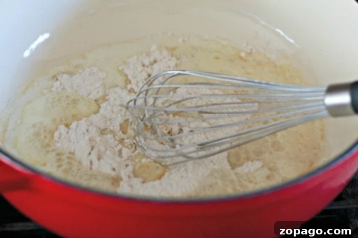 Creamy Homemade Dutch Oven Mac and Cheese 3 Steps on how to make a roux for cheese sauce