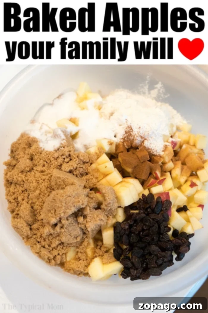 Easy baked apples with cinnamon in your oven will be your favorite dessert or brunch item! Like homemade apple pie filling without the crust, it's amazing. #bakedapples #apples #dessert #fruitdessert #appledessert #applepiefilling A large bowl filled with diced apples, brown sugar, and cinnamon, ready for mixing.