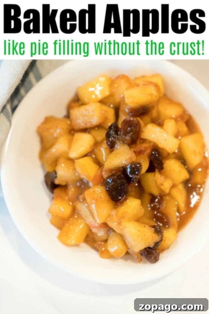 Easy baked apples in your oven will be your favorite dessert or brunch item! Like homemade apple pie filling without the crust, it's amazing. #bakedapples #apples #dessert #fruitdessert #appledessert #applepiefilling A serving of homemade apple pie filling, emphasizing the rich, saucy texture.