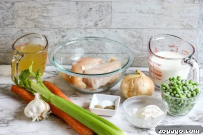 Ninja Foodi Chicken Pot Pie 3 Essential chicken pot pie ingredients laid out for preparation
