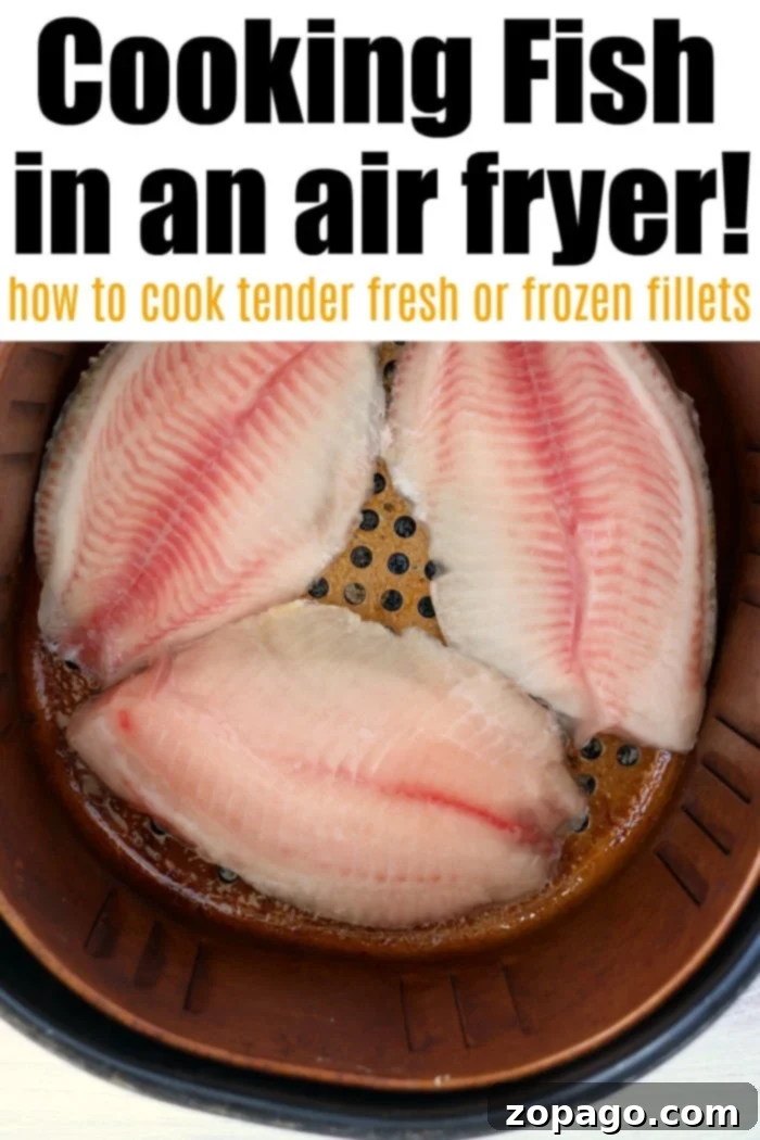 Crispy Low-Carb Air Fryer Meals 13 Three raw fish fillets meticulously arranged inside an air fryer basket, providing a clear visual guide on how to perfectly cook fresh or frozen fish using concise air frying instructions.