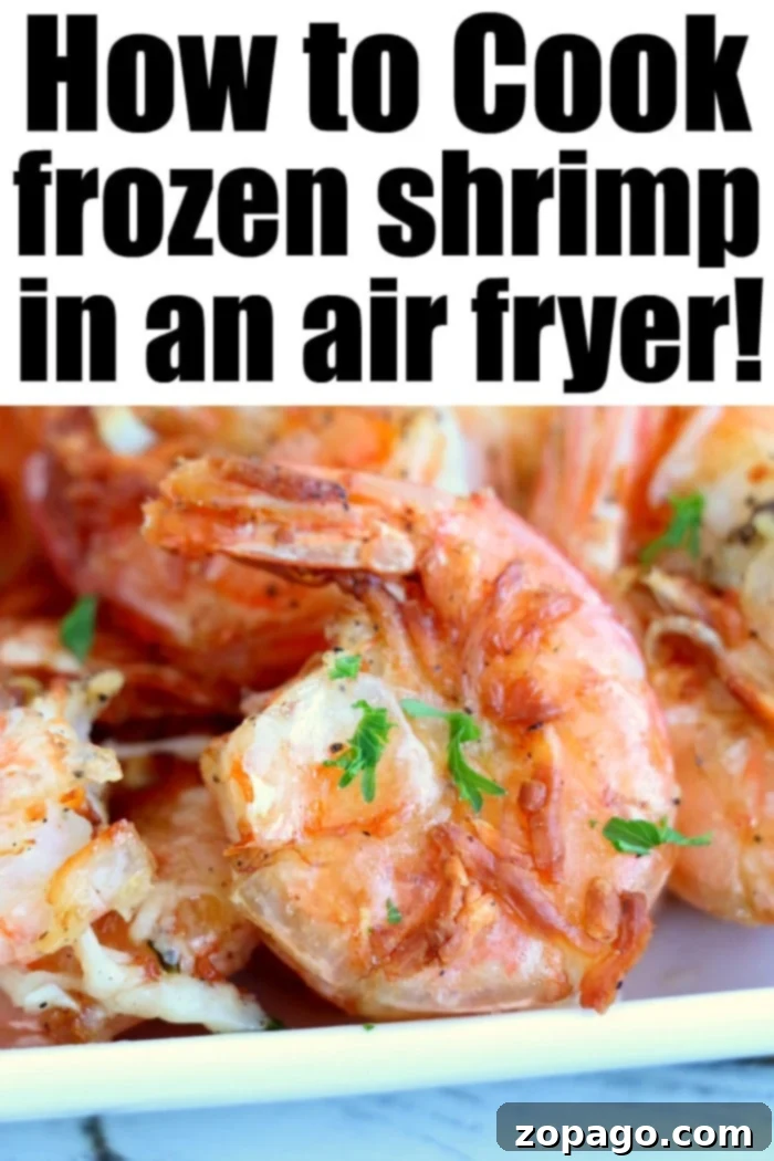 Crispy Air Fryer Frozen Shrimp 7 A plate of perfectly cooked, unbreaded shrimp, garnished with fresh herbs, highlighting the delicious results achievable in an air fryer.