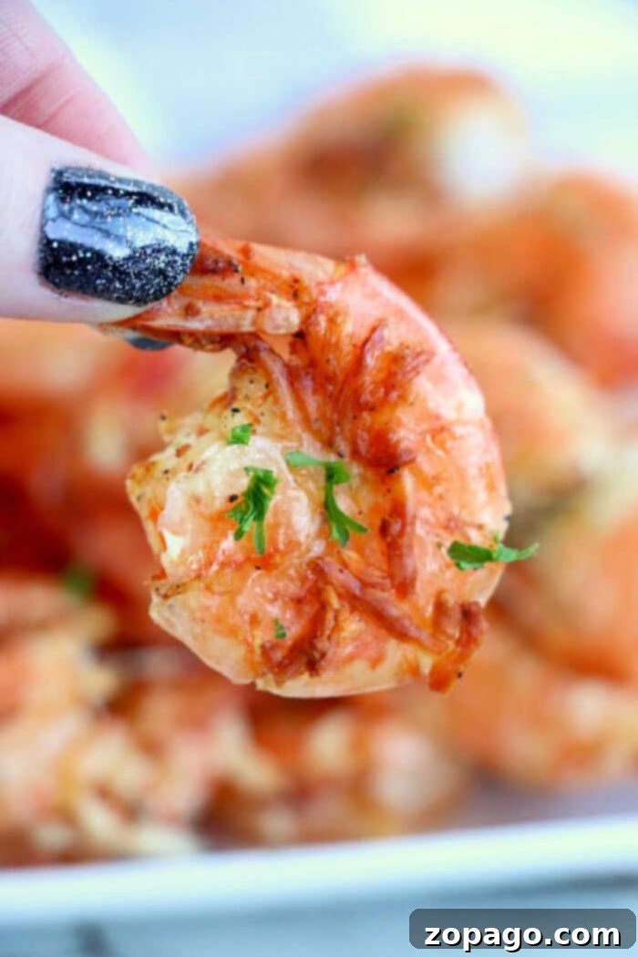 Crispy Air Fryer Frozen Shrimp 8 A bowl of perfectly cooked unbreaded air fryer frozen shrimp, showcasing their juicy texture and delicious appeal.