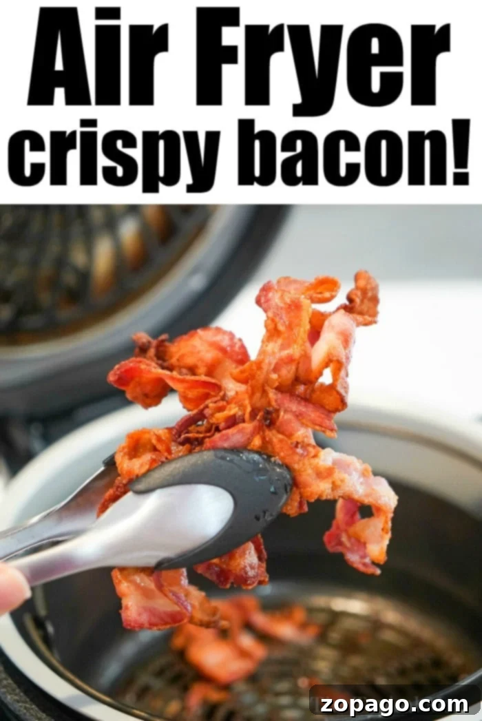 Best air fryer bacon! Grease drips away and it get crispy in no time at all for breakfast. Try Ninja Foodi bacon this morning and see. #airfryerbacon #bacon #airfryerrecipes #ninjafoodi #foodi #thetypicalmom Best Air Fryer Bacon