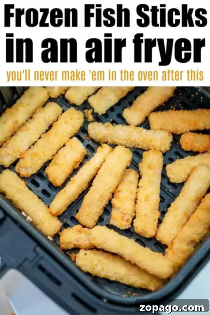 Fish sticks in the air fryer are the bomb! WAY better than cooking them in your oven, this way you'll get ultra crunchy crispy battered fish in just a few minutes. #airfryerfish #fishsticks #airfryer #airfryerrecipes A close-up of frozen fish sticks arranged in an air fryer basket. The text at the top reads,