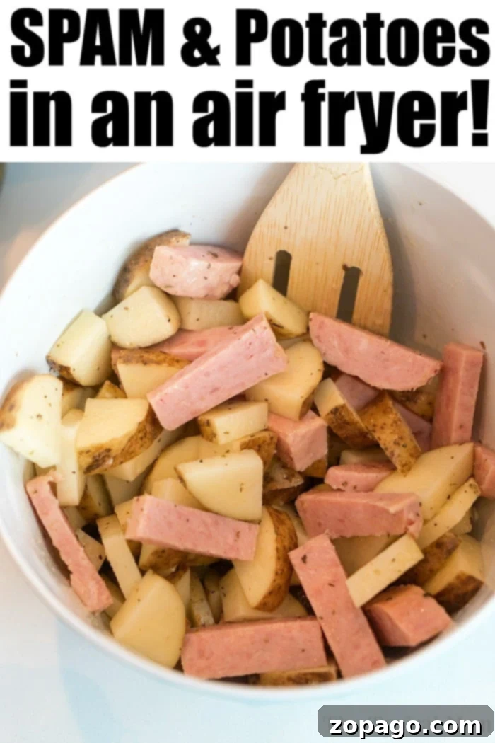 SPAM and diced potatoes is completely delicious meal in under 20 minutes flat! #spam #airfryer #spamrecipes #ninjafoodi #spamandpotatoes #airfryerspam #airfryerpotatoes SPAM and diced potatoes cooked together in an air fryer, making a complete meal.