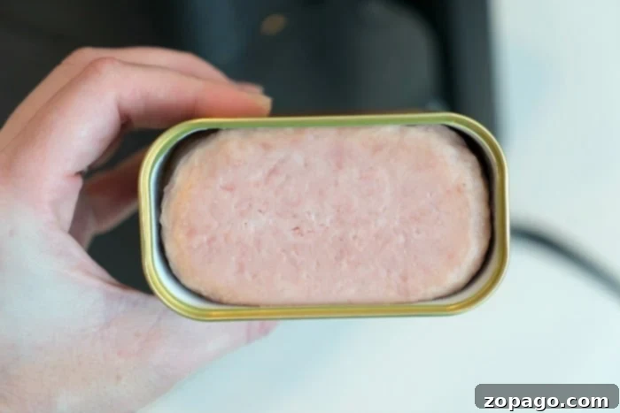 Crispy Air Fryer Spam 3 Sliced SPAM arranged neatly, ready to be cooked in an air fryer.