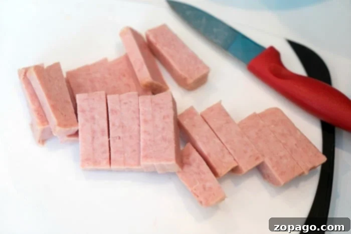 Crispy Air Fryer Spam 4 Crispy air-fried SPAM slices, perfectly golden brown and ready to eat.