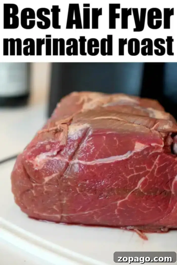 Crispy Air Fryer Roasts 6 Raw marinated roast beef on a white surface with text above reading "Best Air Fryer Roast: Experience the Perfect Air Fryer Roast Beef.