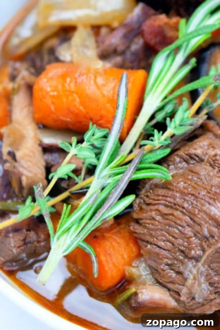 Beef Bourguignon cooked with red wine, vegetables and seasonings turns out amazingly tender and flavorful! Pressure cooker Beef Bourguignon with Stew Meat, ready to serve.