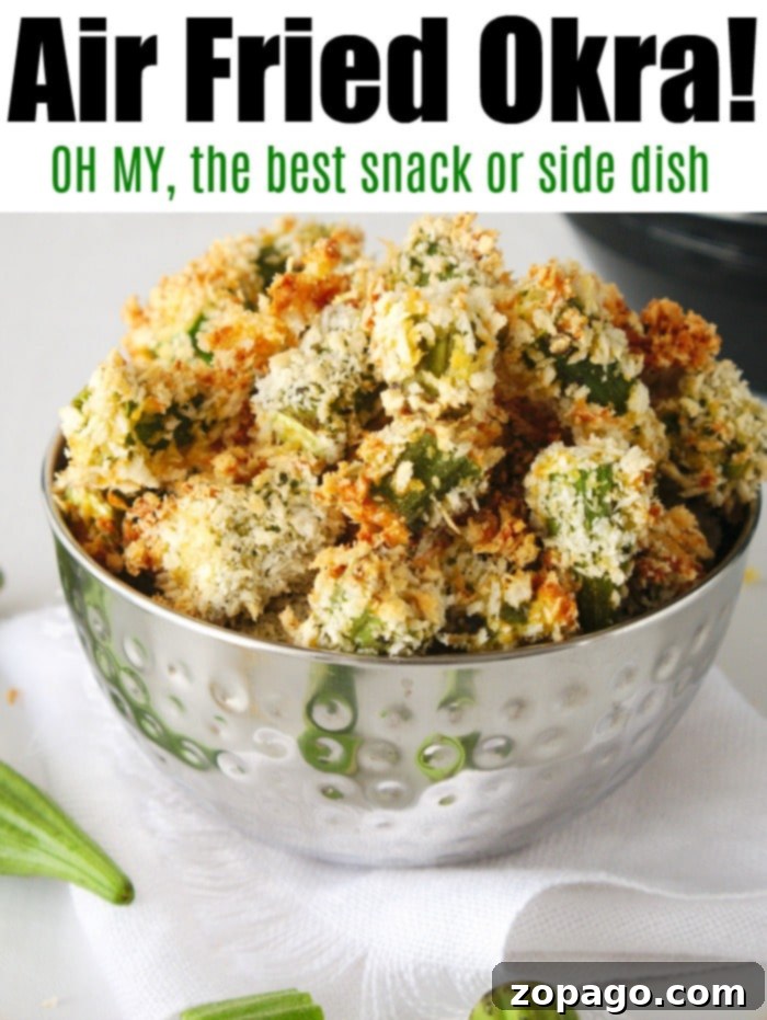 Golden Crispy Air Fryer Okra 7 A bowl of delicious air fryer okra with a crispy coating is elegantly placed on a white napkin, highlighting its appetizing texture.