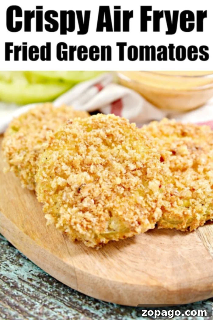 Best air fryer fried green tomatoes are easier to make crispy delicious than you might think! How to make your favorite crunchy vegetable side dish tonight. #greentomatoes #airfryerrecipes #ninjafoodi #airfryer Platter of Air Fryer Fried Green Tomatoes with Dipping Sauce